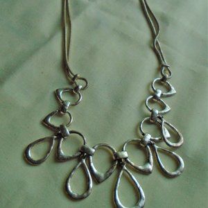 NW signed modern loop design necklace